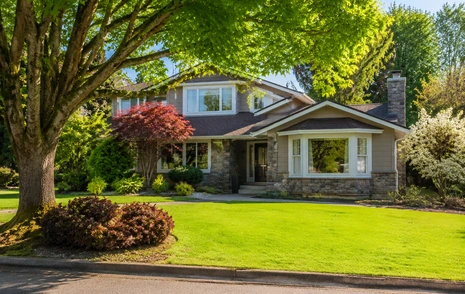 A detached family home with a wide front lawn in Abbotsford BC