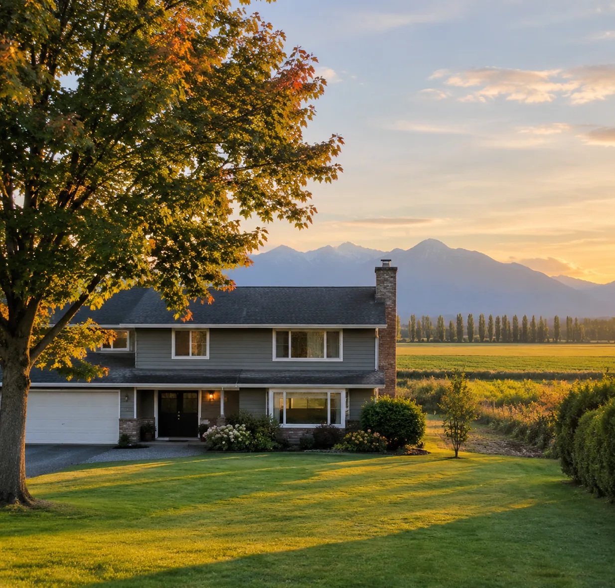 A detached family home on a wide lot with farm fields behind in Aldergrove, Langley BC