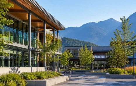 A modern university campus building with a landscaped plaza in Chilliwack BC