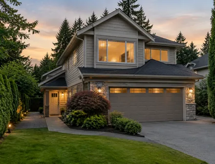 A 2 storey house with a separate lower level entrance on a Fraser Heights street in Surrey BC