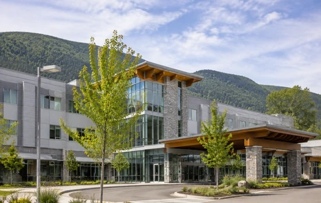 A community hospital building with a landscaped forecourt in Mission BC