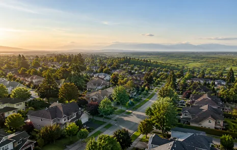 Rooftops of detached homes on a residential grid in North Delta, BC
