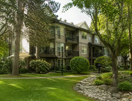 A small 3 storey condo building among trees, condos for sale in Panorama Ridge, Surrey