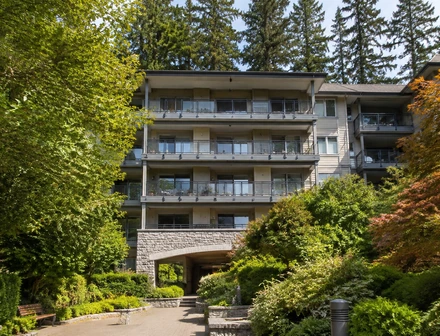 A low rise condo building on a treed street, condos for sale in South Surrey BC