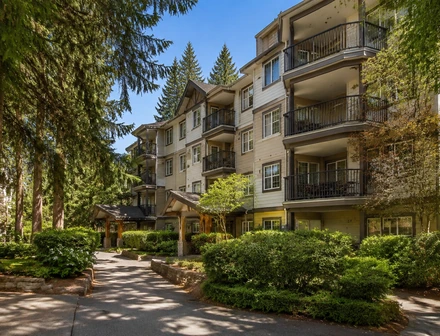 A low rise condo building surrounded by mature trees, condos for sale in Walnut Grove, Langley