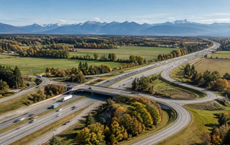 A highway interchange with farmland and mountains beyond near Mount Lehman Road in Abbotsford BC